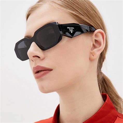 prada ladies' black sunglasses with grey lens